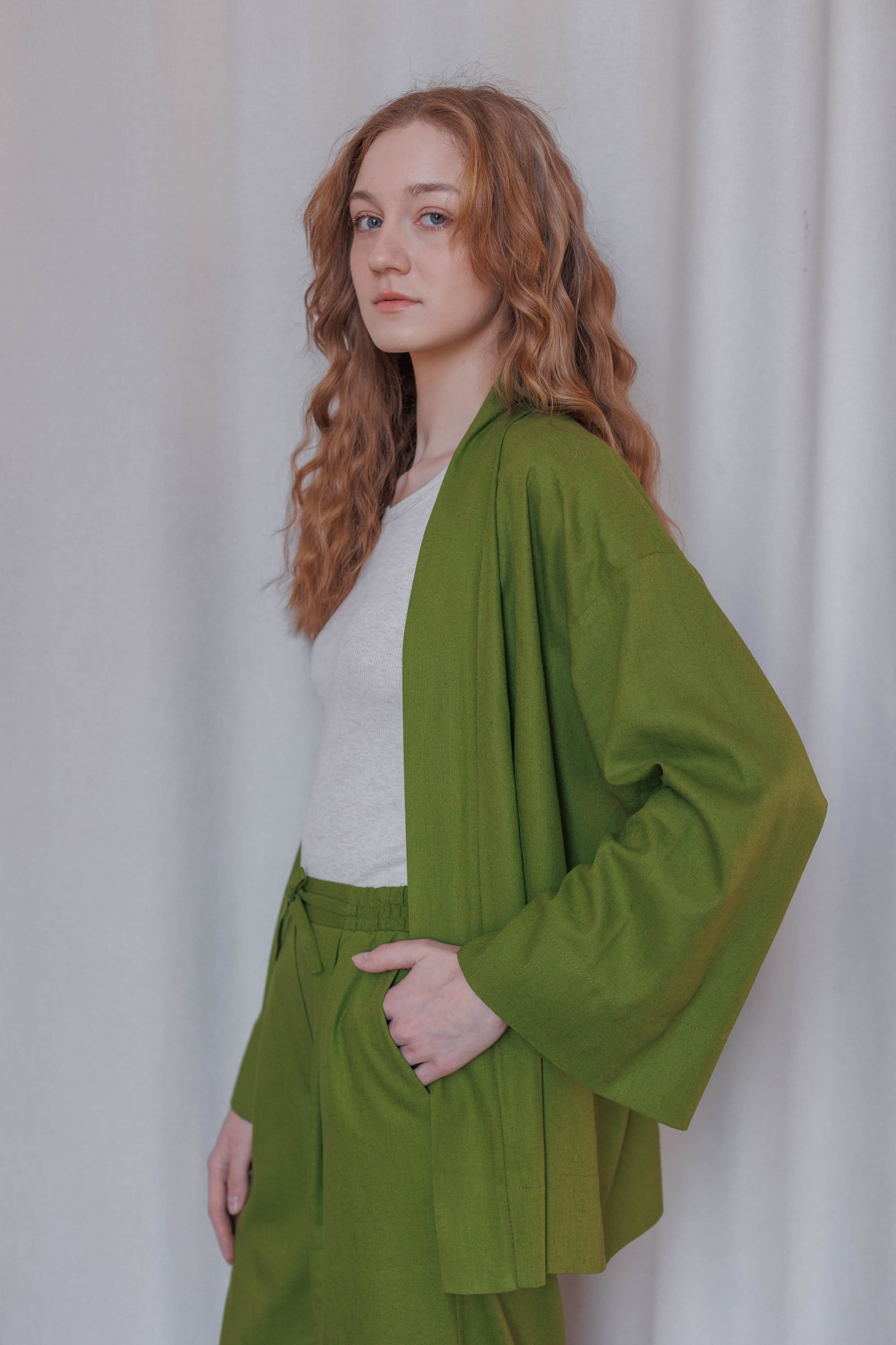 Relaxed fit women’s kimono blazer in olive green natural fabric paired with matching loose pants