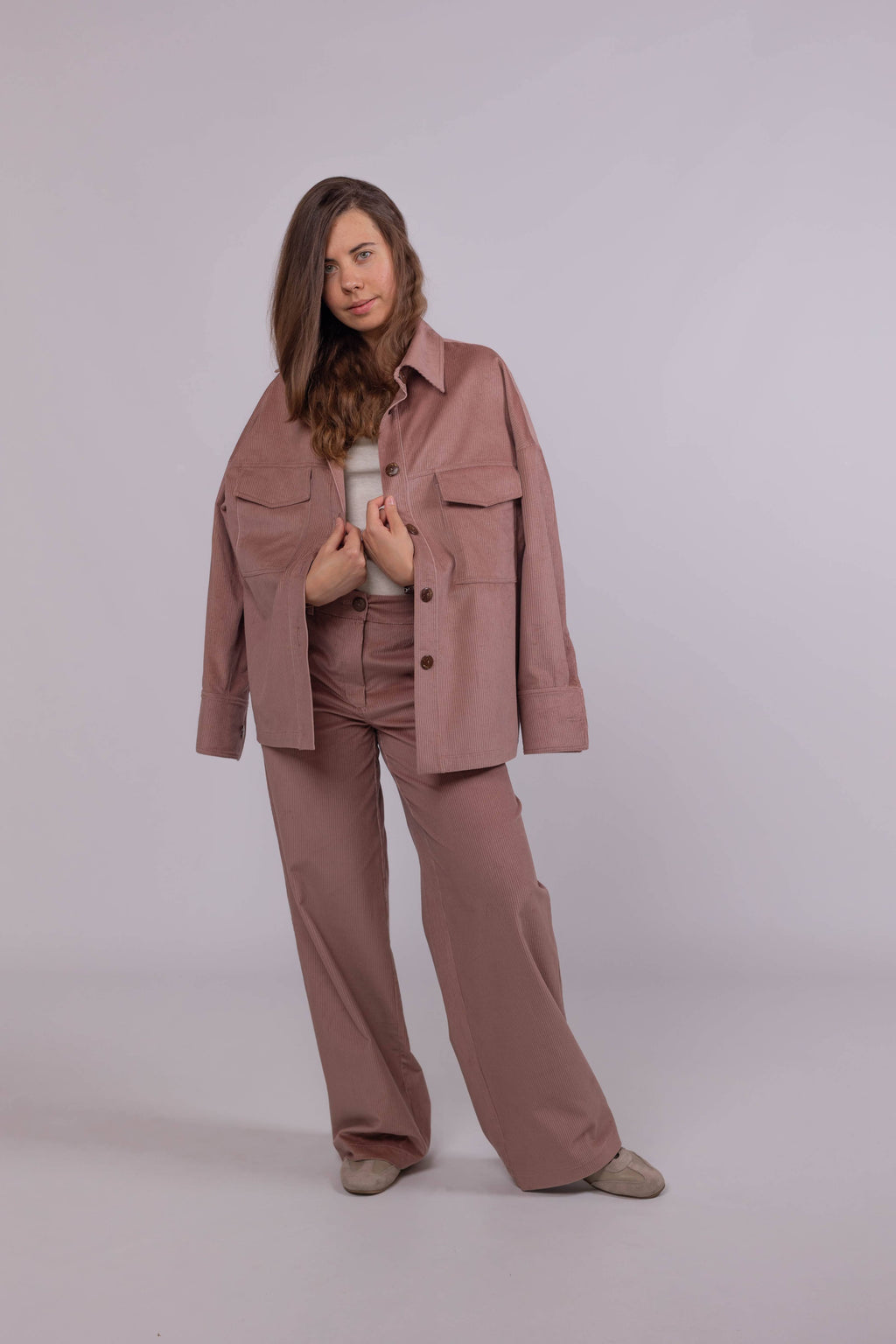 Women’s cotton corduroy overshirt with medium wale texture, patch pockets, and natural coconut buttons.