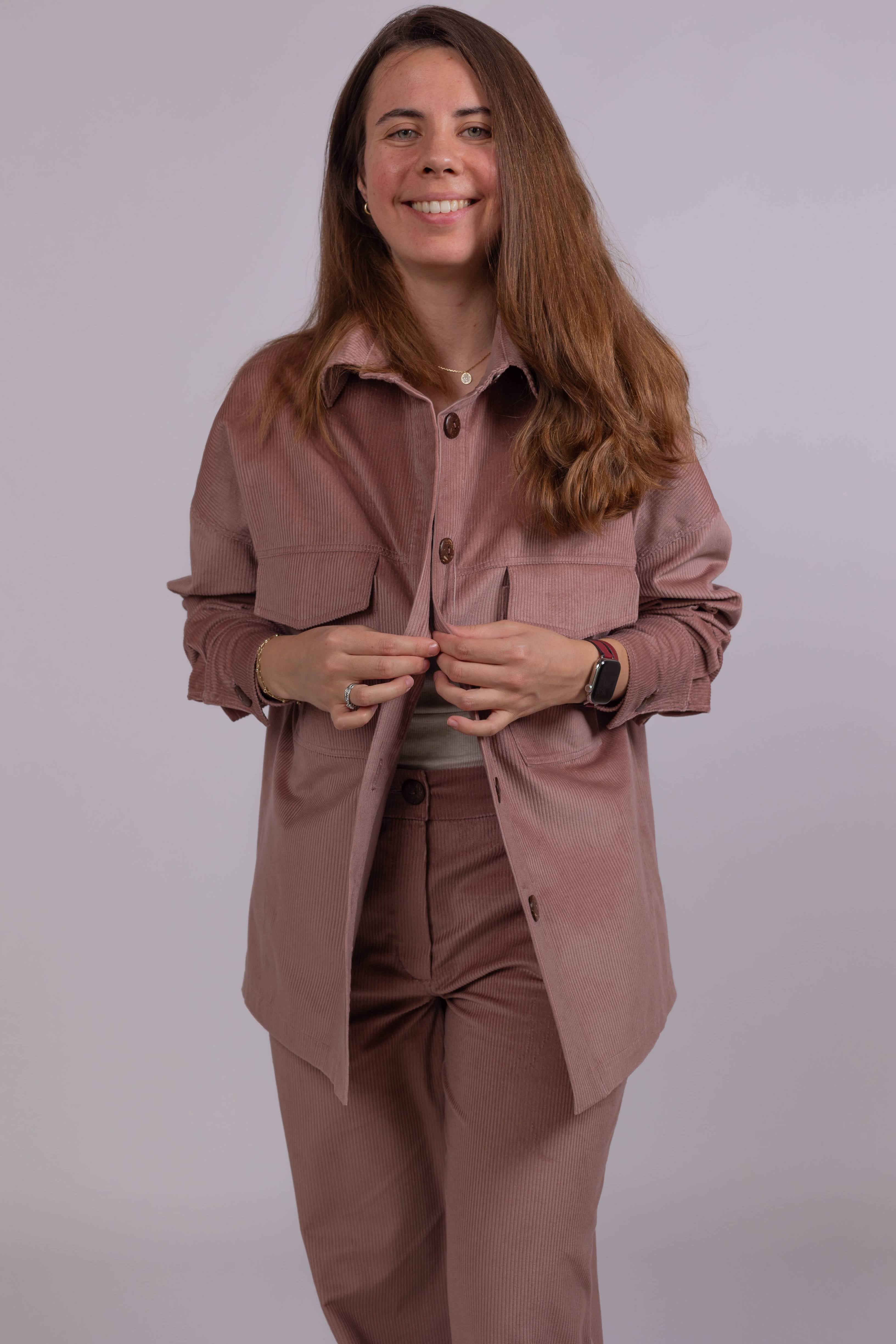Powder pink corduroy shirt for women, oversized silhouette, casual and versatile everyday layering piece.