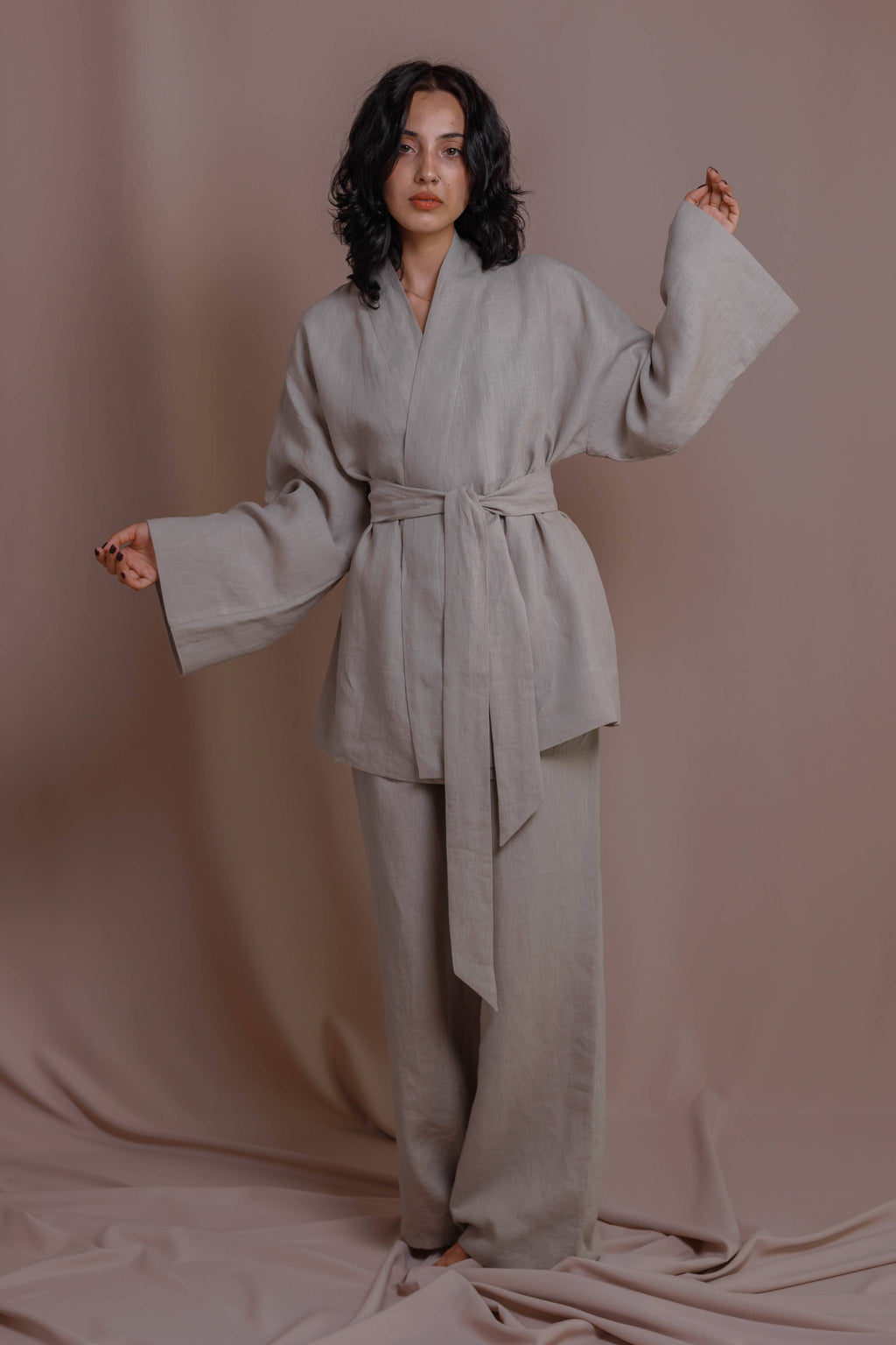 Light gray boiled linen kimono with wide sleeves displayed on neutral background.