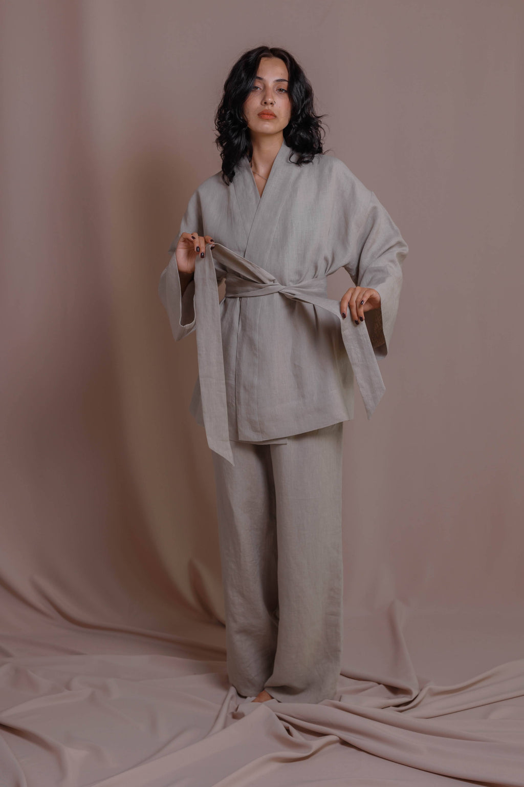 Light gray boiled linen kimono with wide sleeves displayed on neutral background.