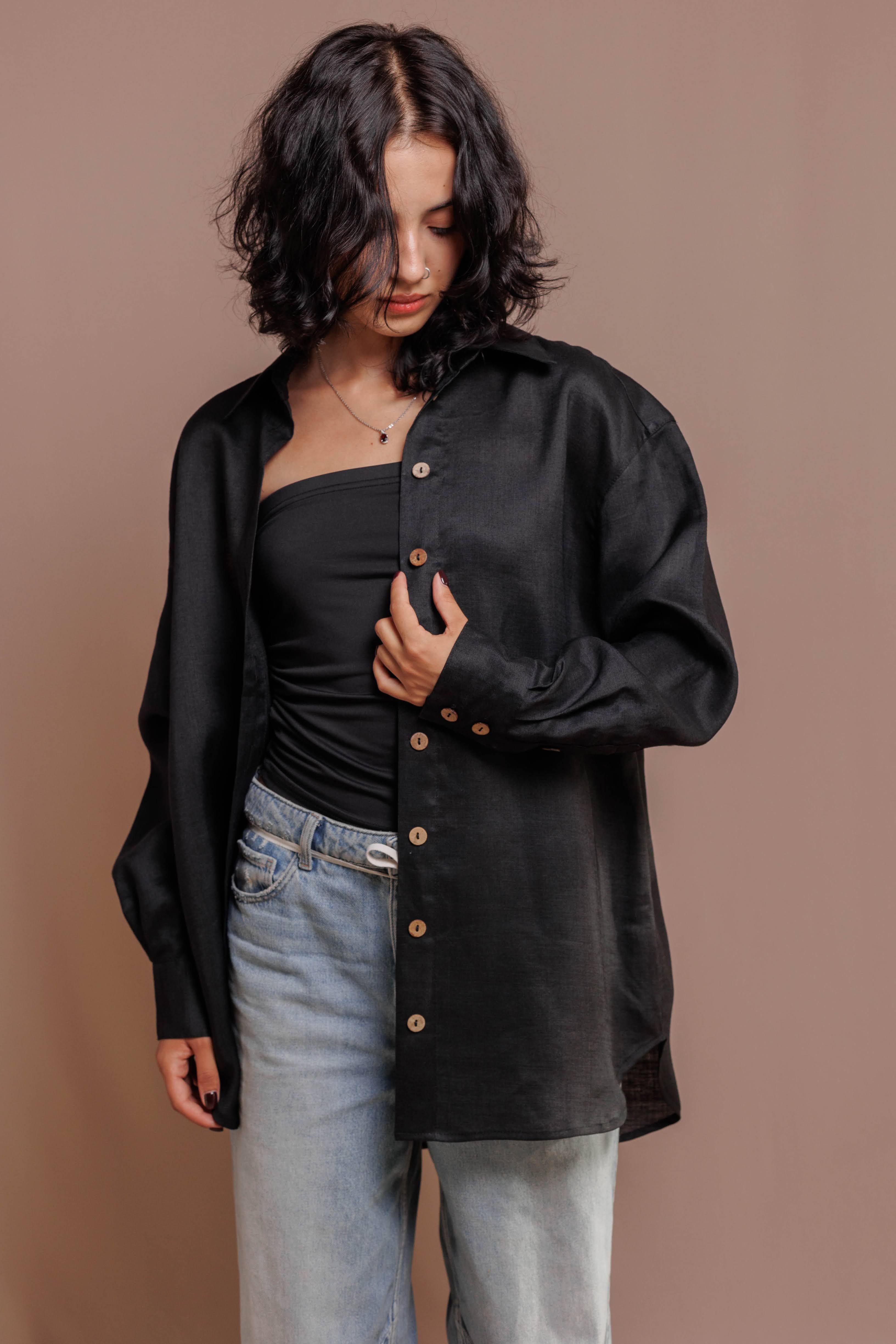 Classic oversized black shirt in ramie fabric with soft structure and natural texture