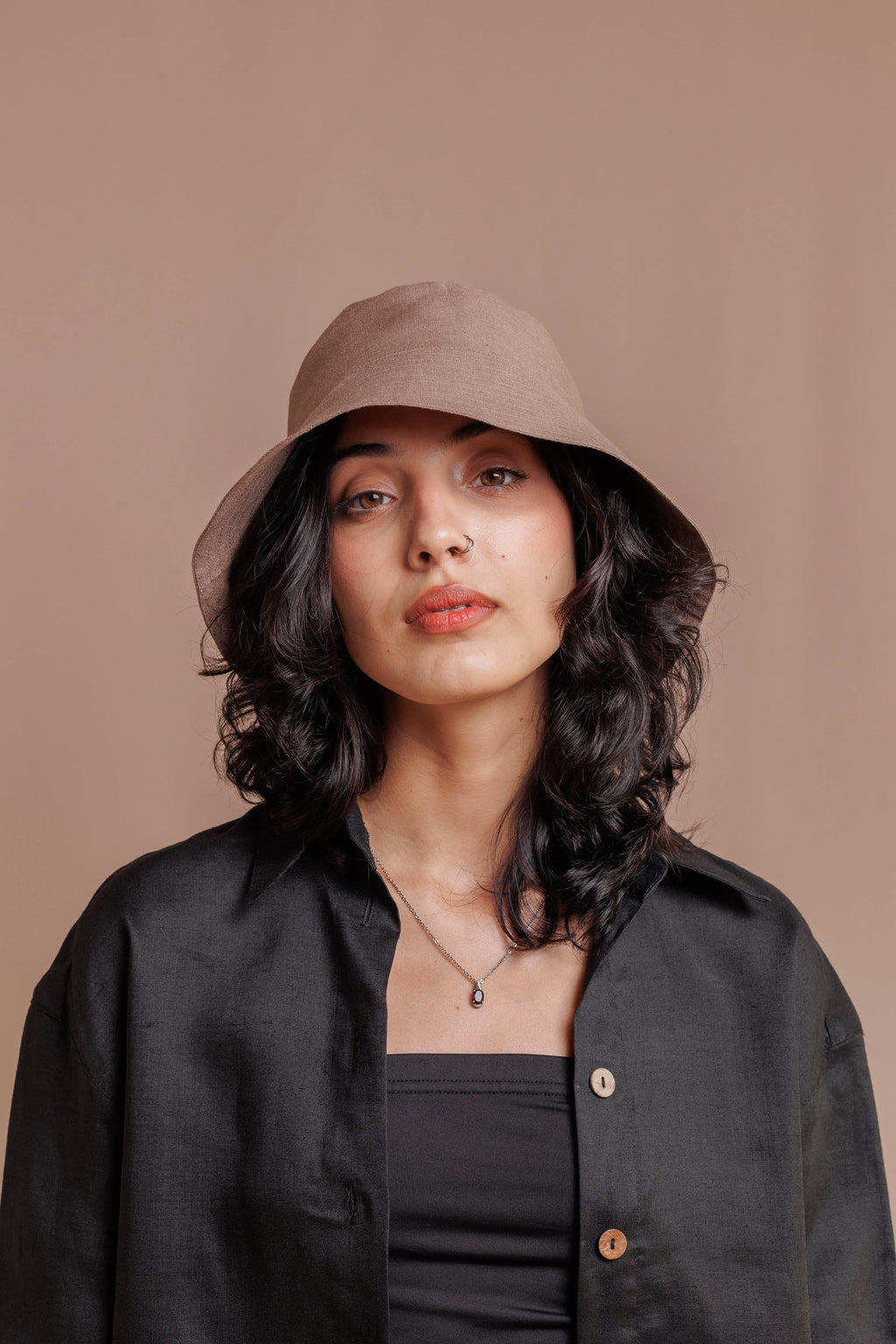 Eco friendly linen bucket hat with wide brim, lightweight and breathable summer accessory