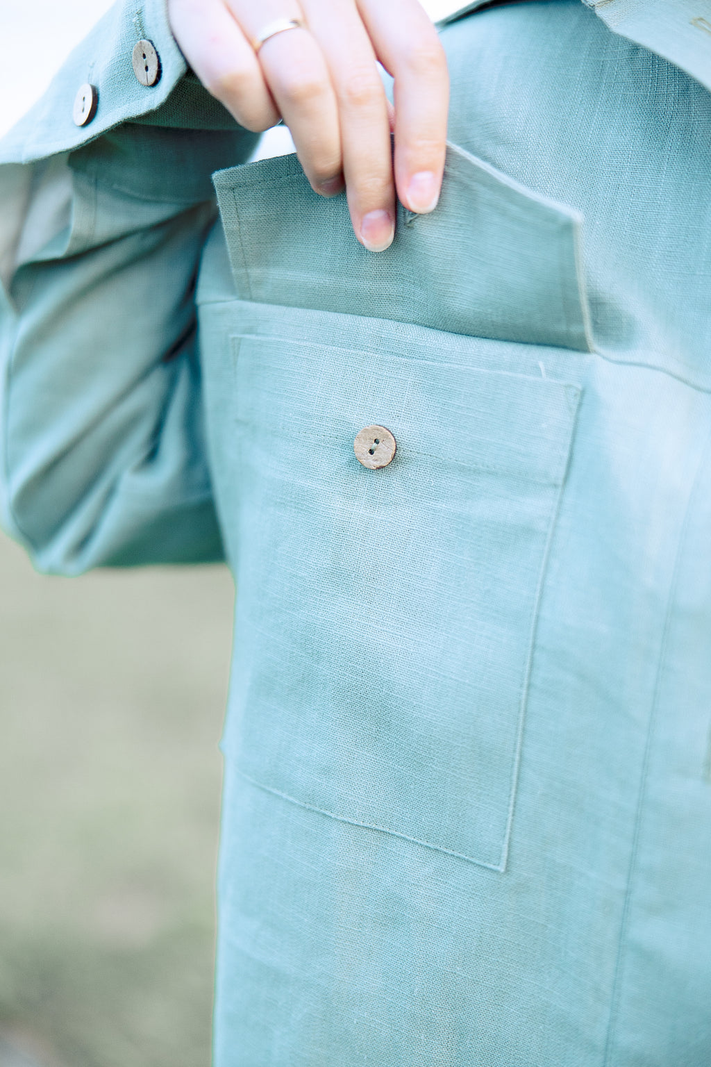 Sustainable women clothing featuring a nettle shirt jacket worn outdoors