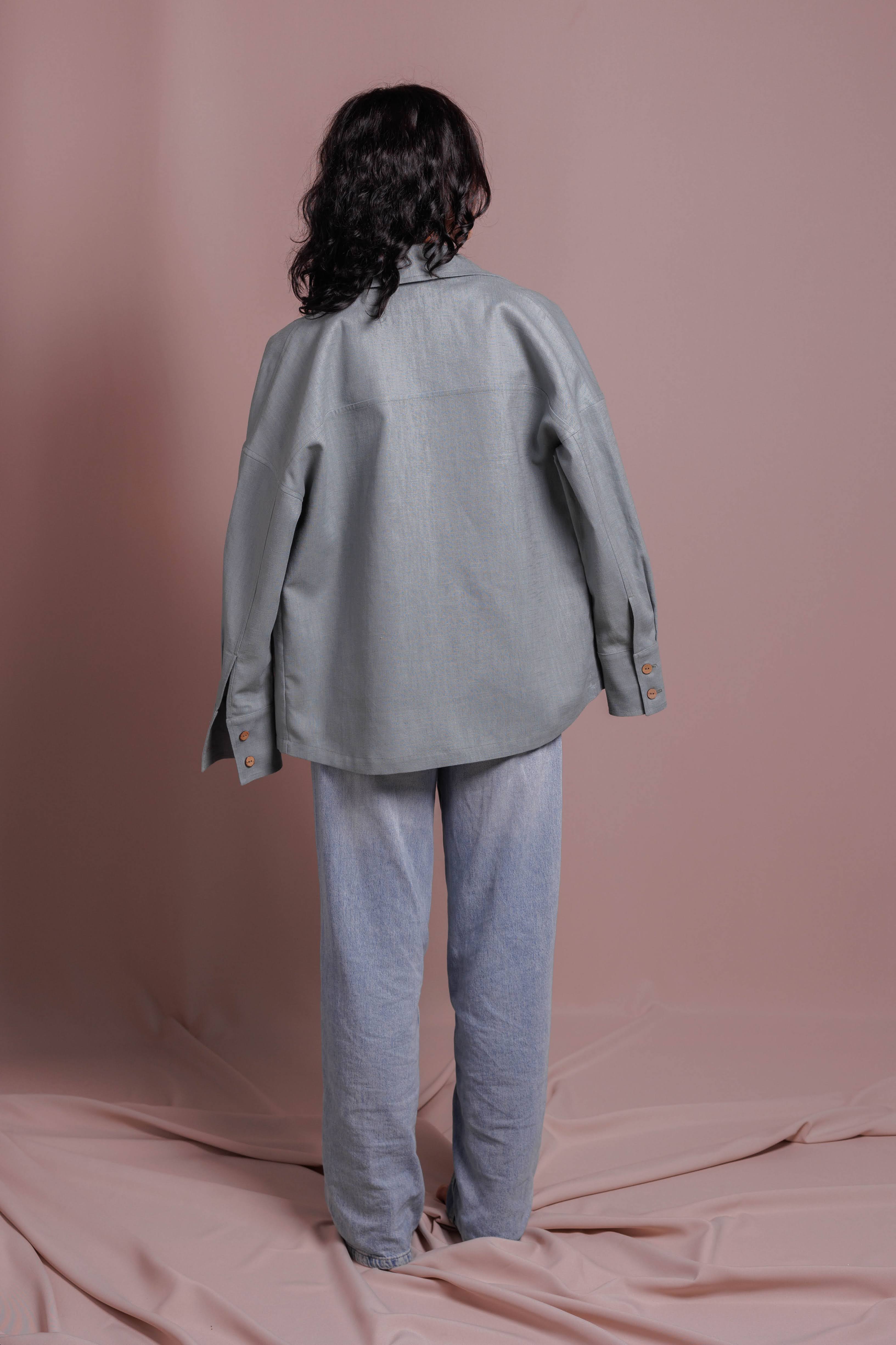 Sustainable women shirt jacket worn as a lightweight outer layer in nature